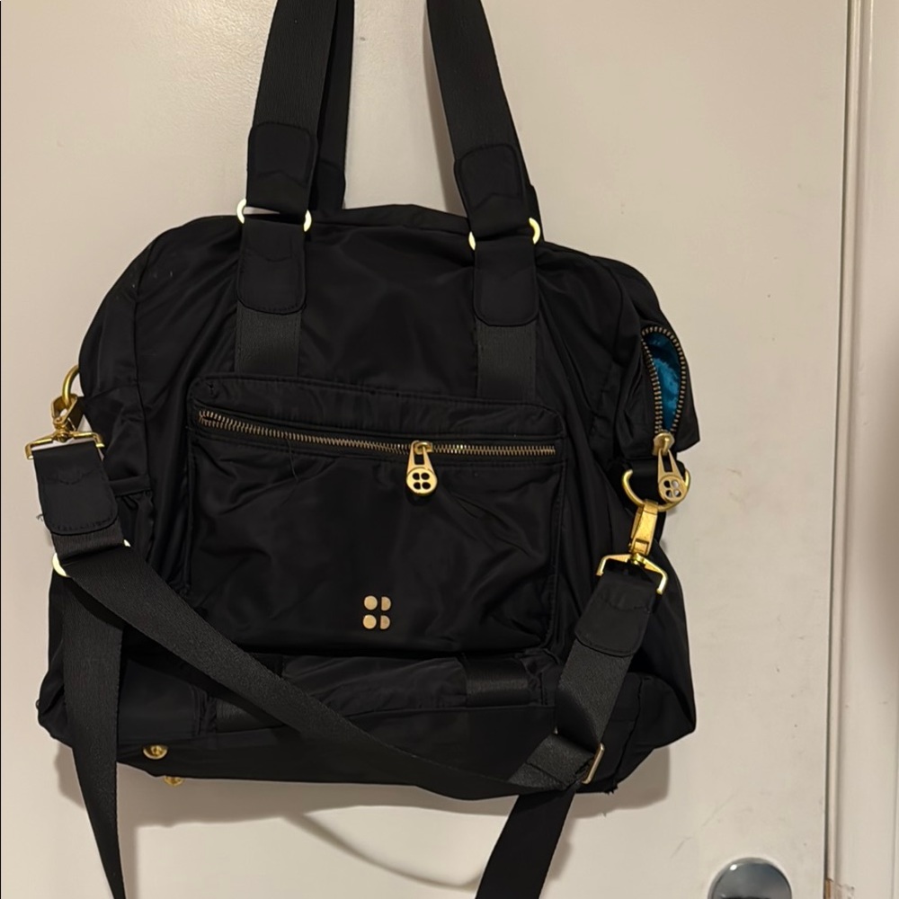 Black Nylon Sweaty Betty Pannier bag. New